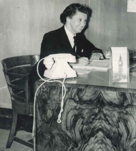 Miss Barbara Brown in charge of the Travel Bureau in the Queen Elizabeth