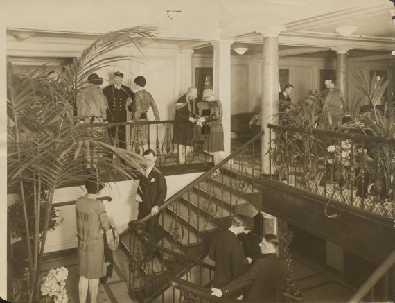 Aquitania second class stairwell with passengers.