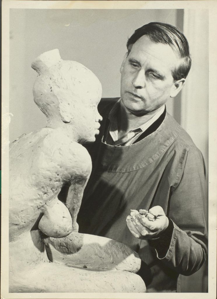 Showing Cubitt creating a sculptor of female figure.