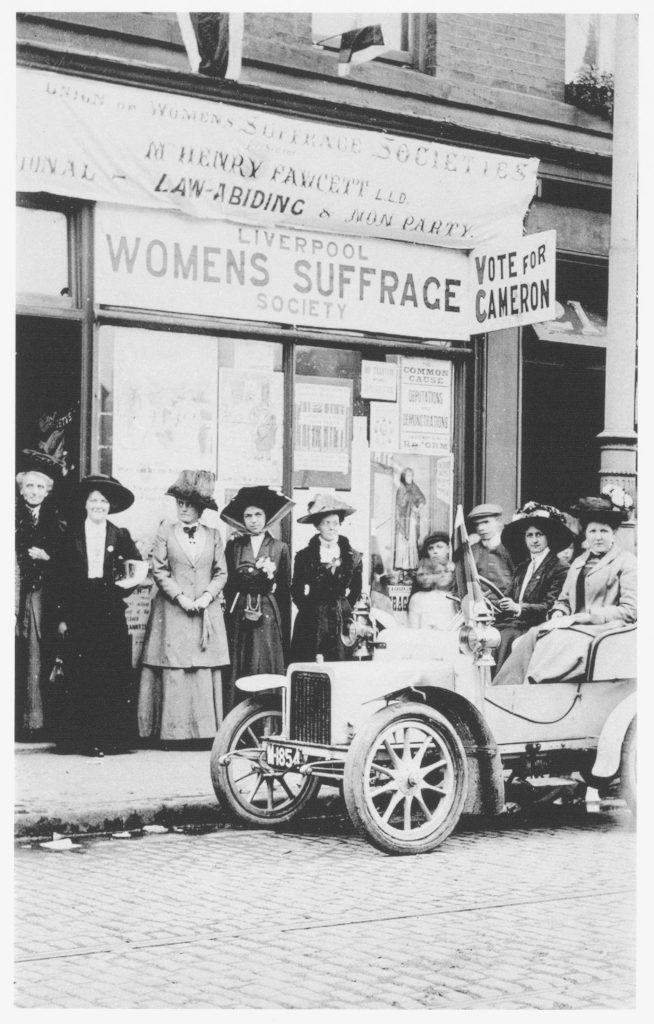 Postcard showing Eleanor Rathbone and other Liverpool suffragists campaigning in support of the pro-women's suffrage candidate in the Kirkdale by-election.