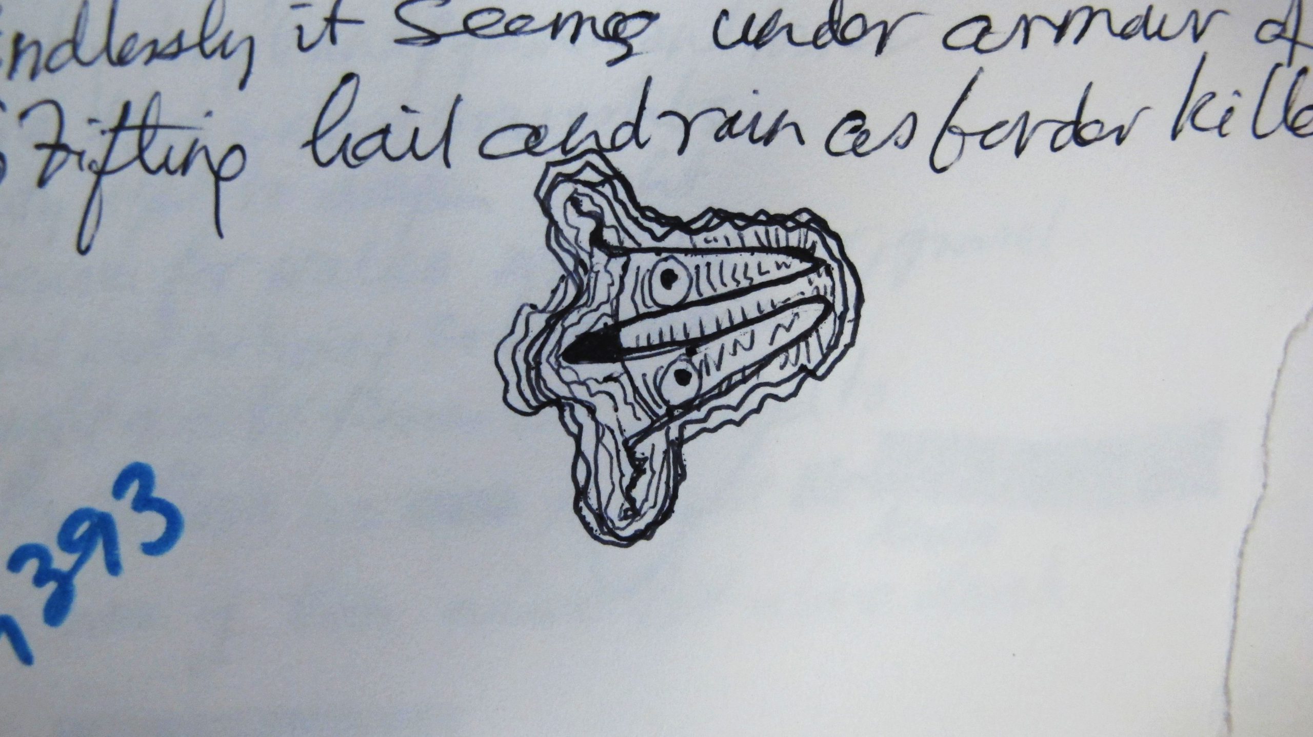 Doodle of a fantasy creature's head.